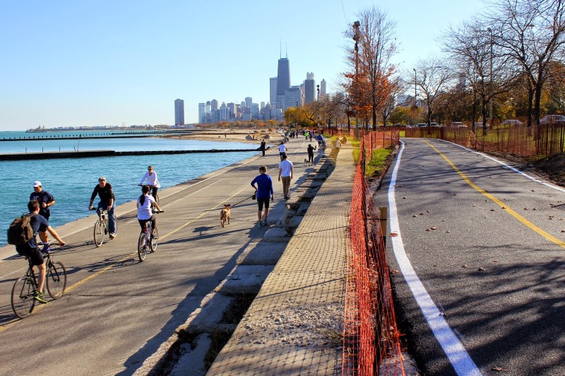 During the lakefront expansion project at Fullerton, a temporary paved path was built next to Lake Shore Drive. Trail separation might look something like this, but with pedestrians on one of the paths and cyclists on the other. Photo: Michelle Stenzel, Bike Walk Lincoln Park