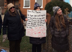 Activists try to deliver a letter to landlord Francisco Macias. Photo: Lynda Lopez