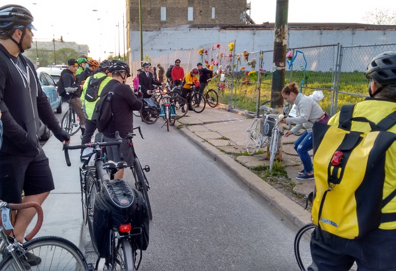 cyclists visit the "ghost bike" memorial for Bobby Cann at the crash site near Clybourn/Larrabee. Photo: Active Trans