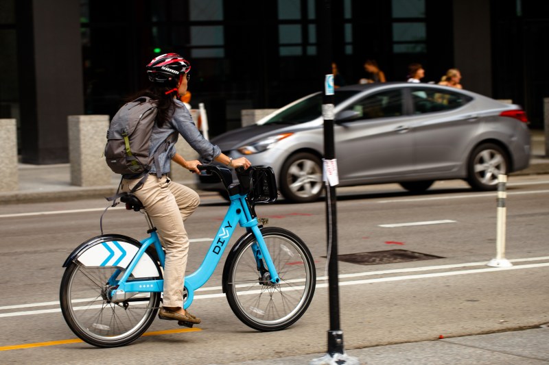 Riding Divvy on Dearborn. Photo: Anne Petersen