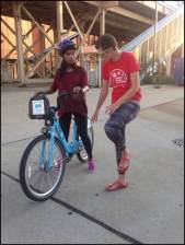 Bicycling 
Ambassador Emme Williams demosntrates the "power start" cycling technique at an adult cycling class at Kennedy King College last year. Photo: CDOT