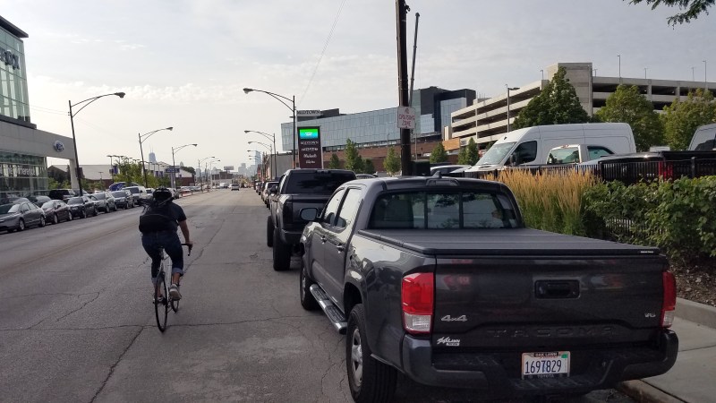 Vehicles in the Elston curbside bike lanes also prevents drivers from using the outside travel lanes. Photo: Cheryl Zalenski