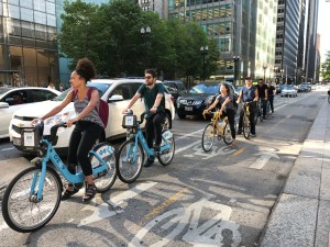 Bike riders line up at the light at Dearborn/Madison. Cutting in line is known as "shoaling." Photo: John Greenfield
