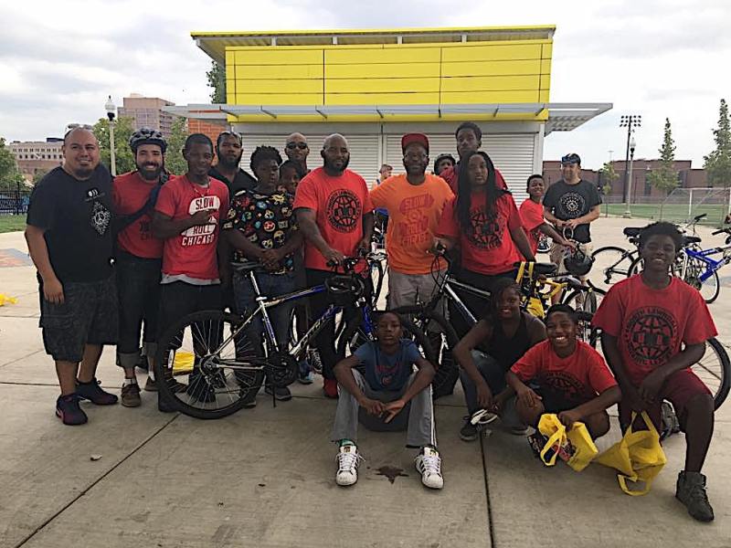 Participants in Slow Roll's "We Ride Juntos: Promoting Safe Neighborhoods" ride last Saturday. Oboi Reed is in orange shirt. Photo: Slow Roll