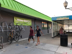 Wall-mounted bike racks and the Blue Line entrance on Spaulding. Photo: John Greenfield