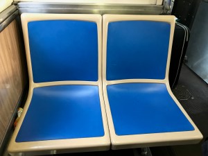 A seat on a Blue Line car with the new plastic panels. Photo: John Greenfield