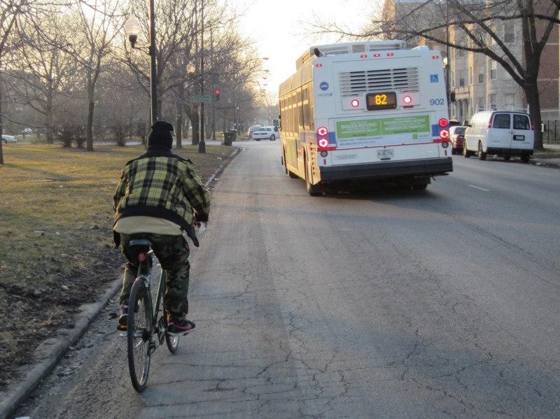 A cyclist rides on Independence Boulevard in North Lawndale, which saw about 80 times as many bike tickets last year as Lincoln Park. Photo: John Greenfield