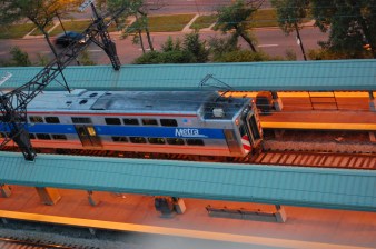 A Metra Electric train in Hyde Park. The new budget earmarks $250M for Positive Train Control, which Metra is required to implement. Photo: Eric Allix Rogers