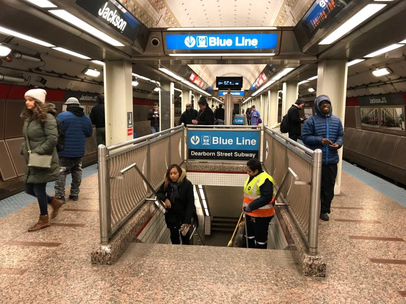 A worker cleans the Jackson Red Line station. Photo: John Greenfield