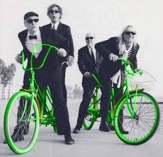Members of the rock band Cheap Trick are Rockford natives, and occasional bike riders. Photo by Danny Clinch, colorized by Dubi Kaufmann.