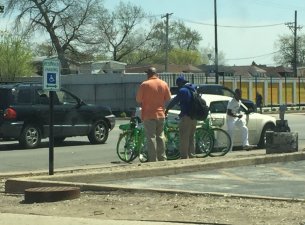 Checking out LimeBikes in Auburn-Gresham. Photo: Bill Savage
