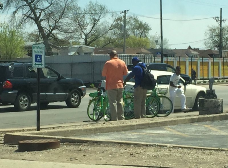 Checking out LimeBikes in Auburn-Gresham. Photo: Bill Savage