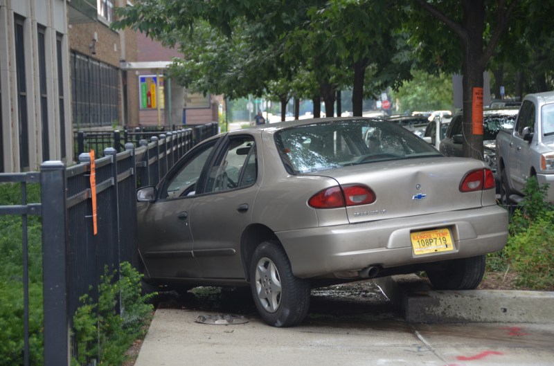 The aftermath of a 2012 police chase in Woodlawn. Photo: Eric Allix Rogers.