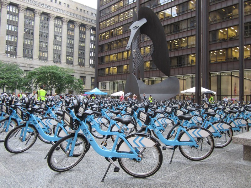 The rainy debut of Divvy bikes at Daley Plaza in June 2013. Photo: John Greenfield