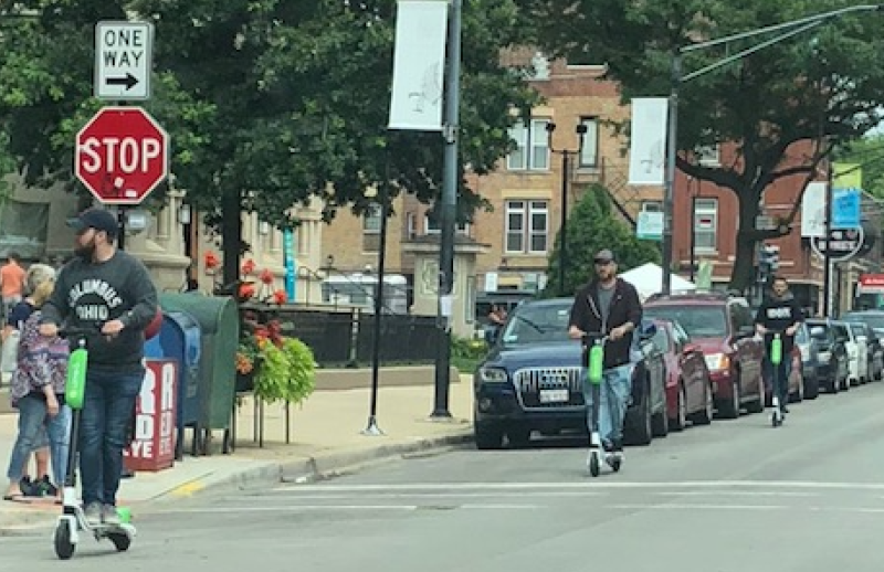 Test-riding Lime scooters in Lincoln Park last weekend. Photo: Lime