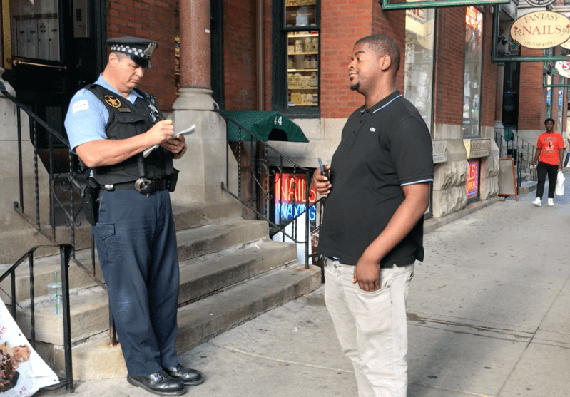 Today an officer wrote a ticket to Hakeem Appling for sitting on some steps. Last month he was arrested for biking on the sidewalk on a Divvy. Photo: John Greenfield