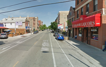 The 1100 block of West 18th Street in Pilsen, where a car passenger doored a 25-year-old man on his bike yesterday, resulting in life-threatening injuries. Image: Google Street View