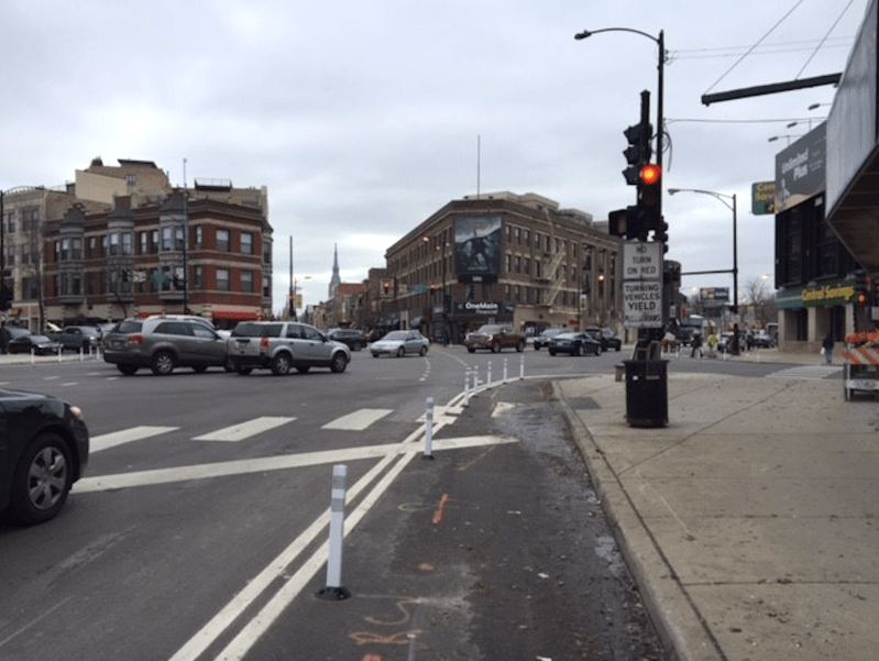 The paint-and-post bump-out at the northwest corner, looking southeast. Photo: CDOT