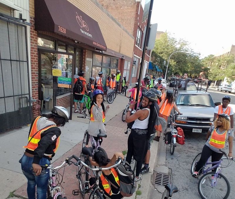 Kids get ready for a ride outside of The Recyclery. Photo: The Recyclery