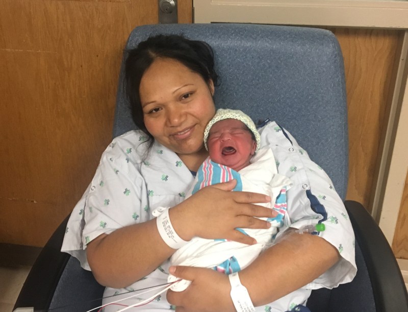 Guadalupe Lara holds her daughter, Samantha, at UIC Hospital. Photo: Sharon Parmet: UI Health