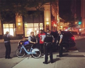 Police arrest Divvy rider Joshua Thomas last August. Photo: Eboni Senai Hawkins