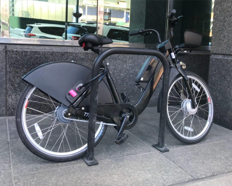 The new electric-assist Divvy bikes (shown here without Divvy and Lyft branding) will have a built-in cable lock, allowing them to be parked at bike racks.