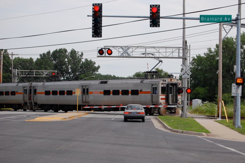 A South Shore Line train crosses Avenue O at Brainard Avenue, on the border between Chicago and Burnham. Photo: Eric Allix Rogers