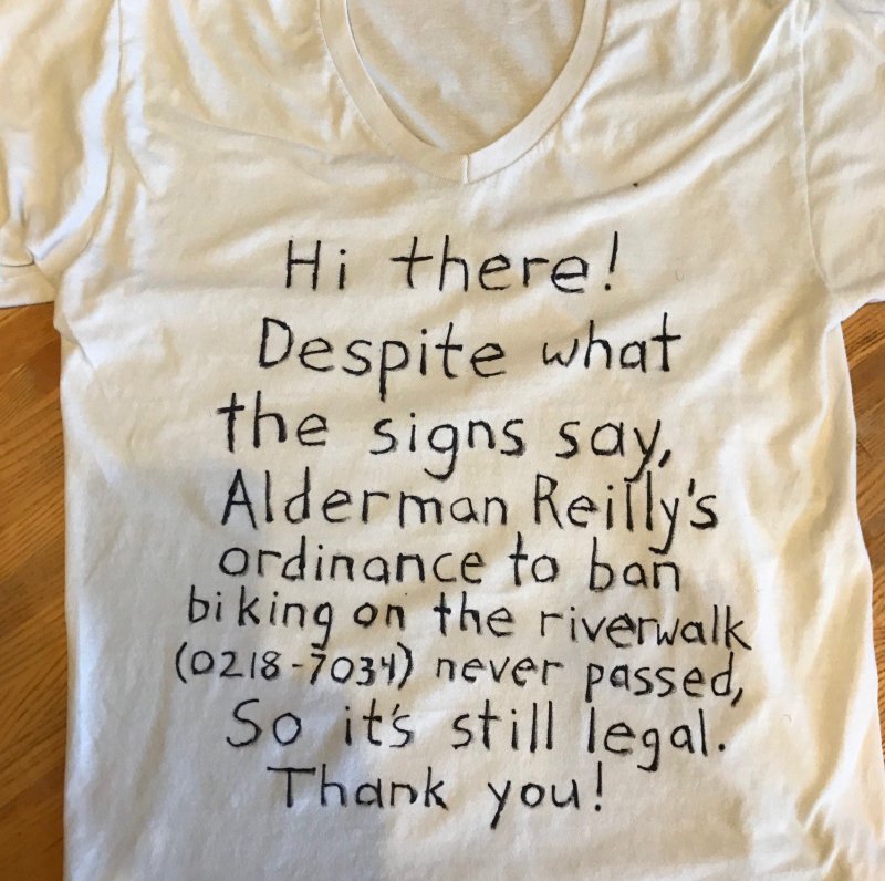 This afternoon I made a t-shirt debunking the myth that biking on the riverwalk is illegal, and wore it for a cruise on the path.