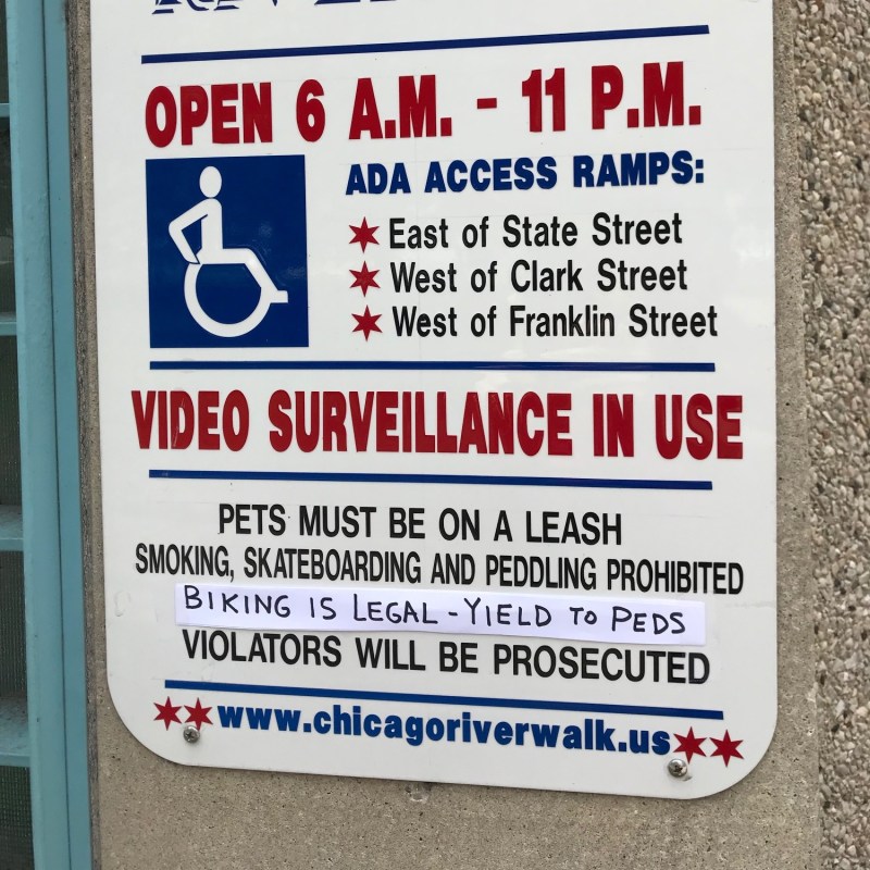 This afternoon I did a little editing to make a riverwalk warning sign reflect reality. Photo: John Greenfield