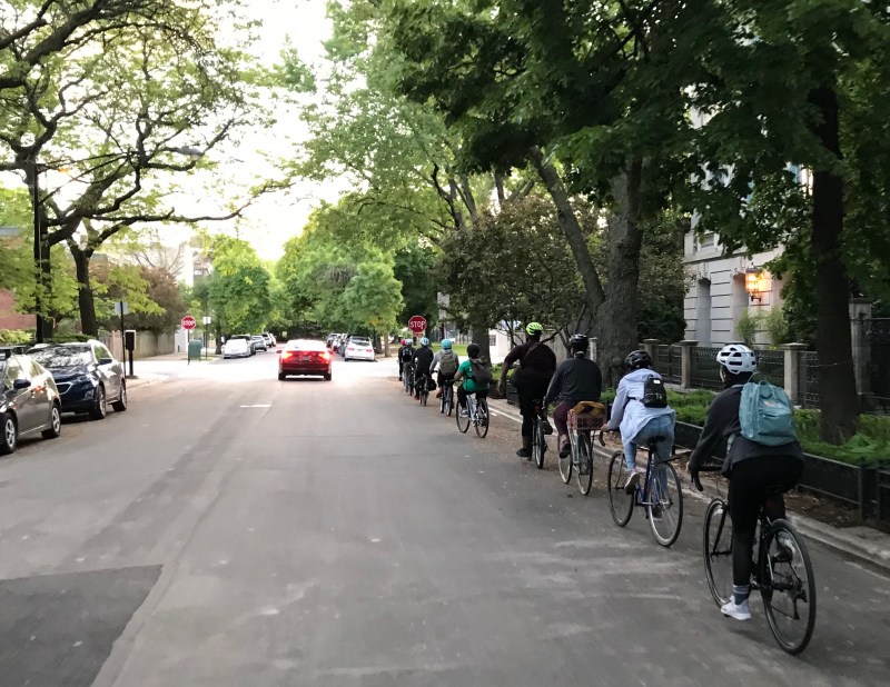 People riding bikes on Dickens Avenue last night. Photo: John Greenfield