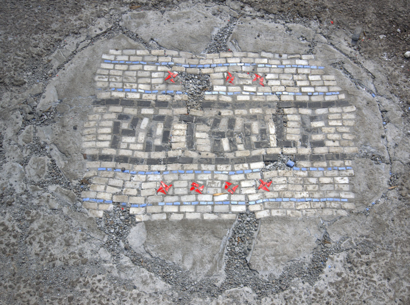 Pothole art by Jim Bachor at 5223 West Argyle in Jefferson Park. Photo: flickr user GMX