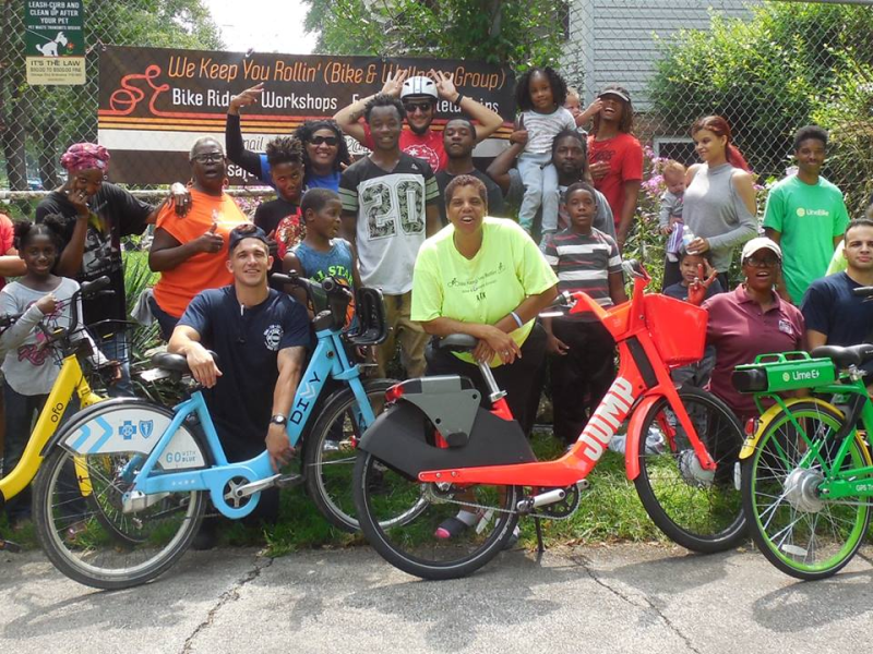 Deloris Lucas (orange shirt) at a We Keep You Rollin' event. Photo: WKYR