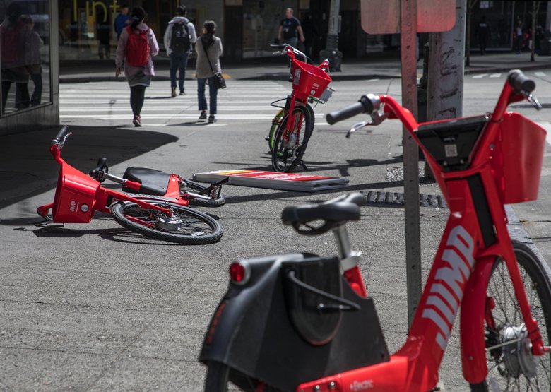 JUMP bikes blocking a sidewalk in Seattle. Photo: Steve Ringman, Seattle Times