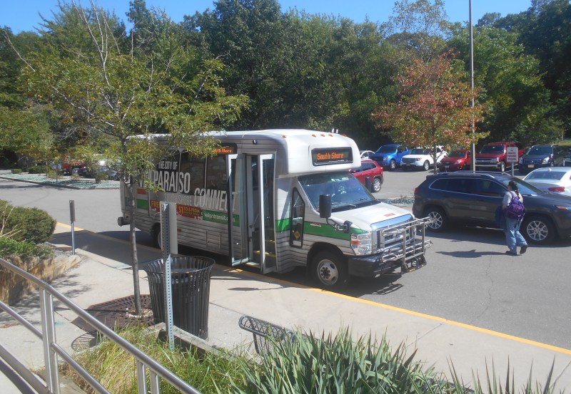 A South Shore Connect bus waits to pick up passengers on Monday afternoon at the Dune Park South Shore Line station. Photo: Igor Studenkov