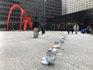The 132 pairs of white-painted shoes placed in Federal Plaza last year to honor the 132 people killed in crashes in 2017. Photo: John Greenfield