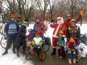 A cold-weather Kidical Mass ride several years ago, put on as part of the Bike Winter movement. Photo via Michael Burton, the Santa with the striped hat.