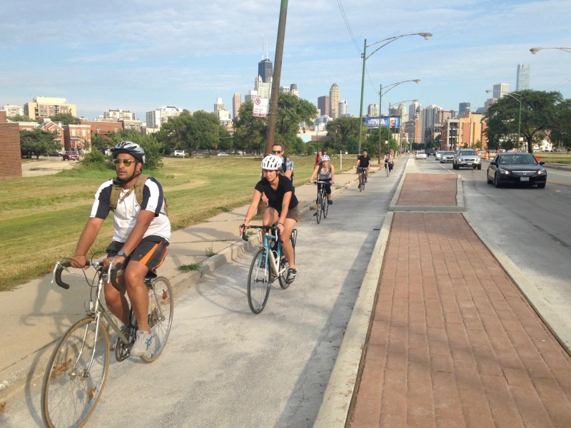 There should be physically protected bikeways on every major Chicago street. Photo: John Greenfield