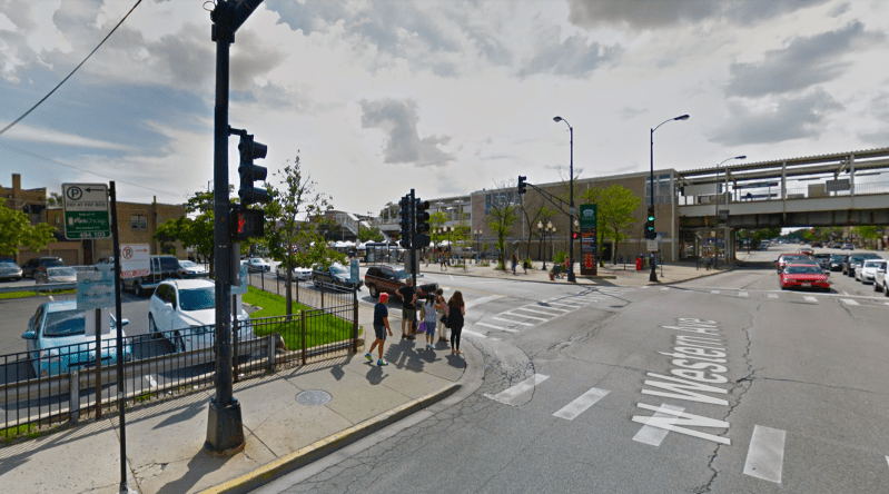 The parking lot, left, with the Lincoln Square farmers market and the Western Brown Line station in the background. Image: Google Maps