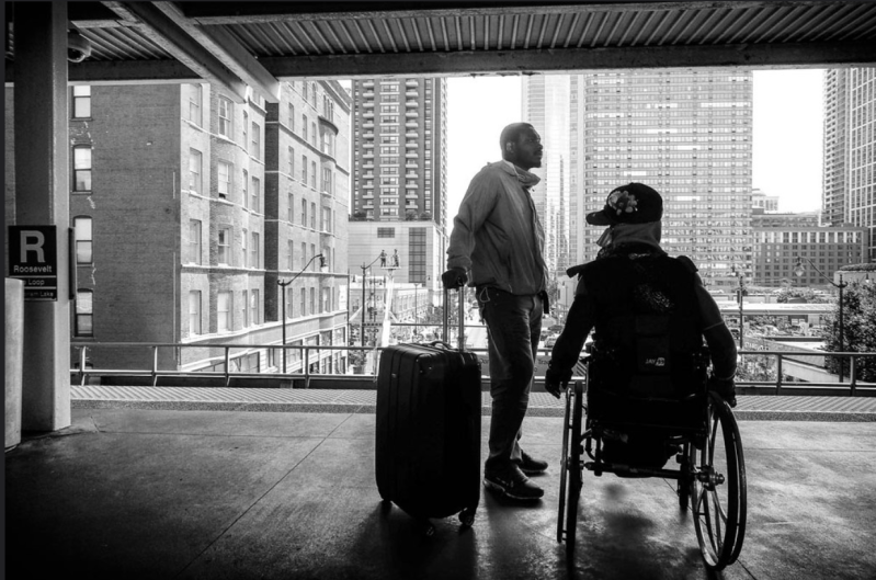 A wheelchair user at Roosevelt Station, which has elevators. The CTA plans to make all stations accessible by 2038. Photo: mkc609