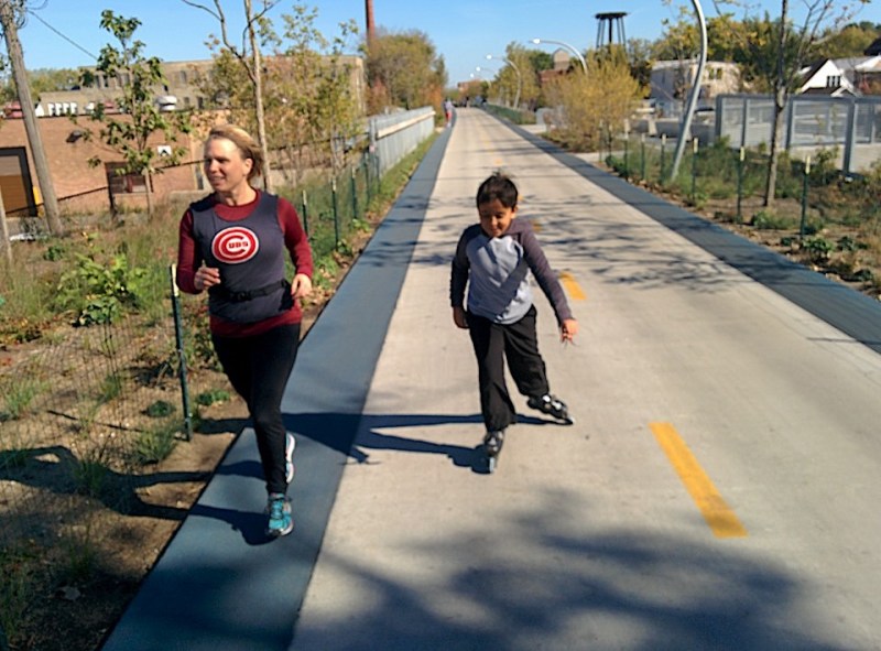 Gin and Miguel Kilgore on The 606. (Gin wanted to mention that she does not endorse the right-wing politics of Cubs owner Joe Ricketts.) Photo: Michael Burton