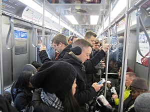 Having lots of people ride on crowded trains is bad idea if we're going to slow coronavirus transmission. Photo: John Greenfield