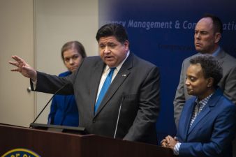 Governor Pritzker and Mayor Lightfoot at a coronavirus press conference. Photo: Ashlee Rezin Garcia, Chicago Sun-Times