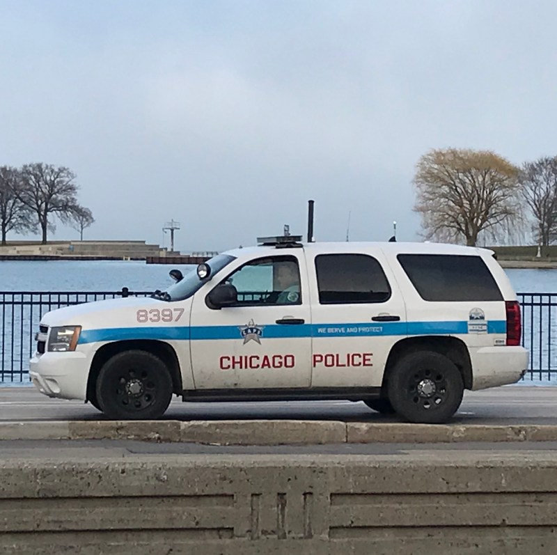 A police officer parked on the trail at Belmont Avenue yesterday evening. Photo: John Greenfield