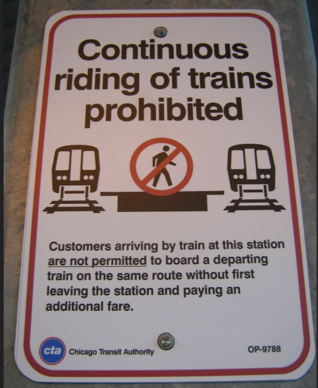 Signs like this are an apparent attempt by the CTA to discourage people from sheltering on trains. Photo: Jeff Zoline