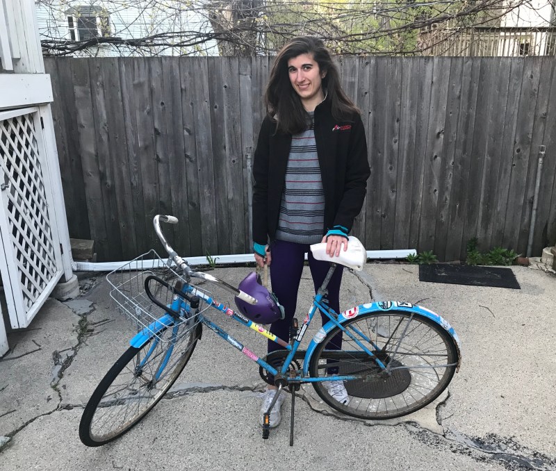 Ariel with her bike, before it was damaged in the crash.