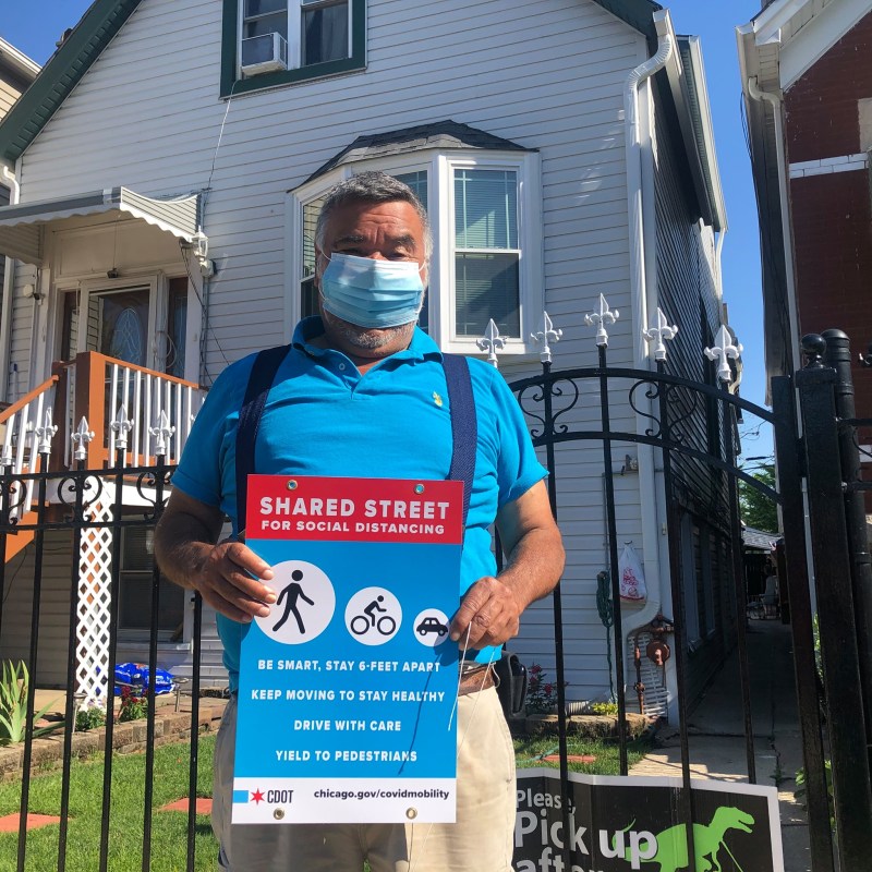 Mr. Tamez, a neighbor on Cortland, asked for a sign to put on his own fence. Photo: Ben Helphand, Friends of the Bloomingdale