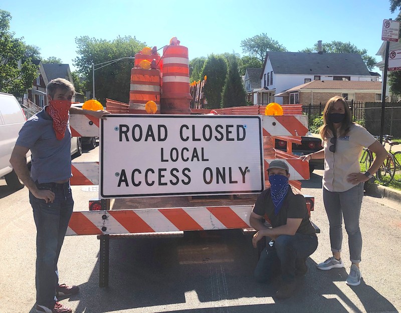 Biagi, right, with 1st Ward alderman Daniel LaSpata and Ben Helphand, president of Friends of the Bloomingdale Trail, at the installation of the Bloomingdale alternative Slow Street route earlier this month. Photo via Helphand