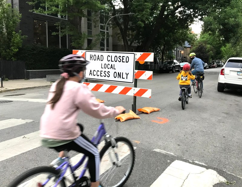 A family bikes on a Slow Street on Wabansia Avenue in West Town. Photo: John Greenfield