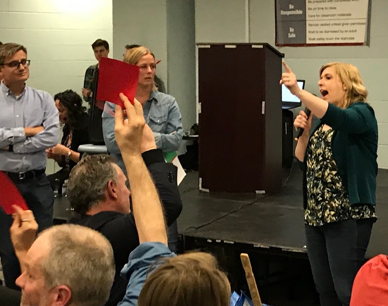 Logan Square Neighbors for Responsible Development members and supporters libertarian lawyer Jacob Huebert, real estate agent Sarah Maxwell, and trial attorney Allison Huebert testified at the final community meeting on the all-affordable TOD last April. Maxwell was named as a plaintiff in the lawsuit. Photo: John Greenfield