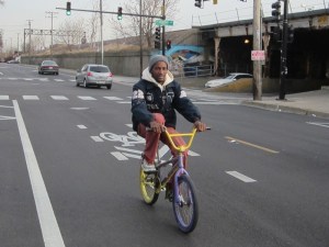 Robert Calvin rides in Chicago's Austin neighborhood. Photo: John Greenfield